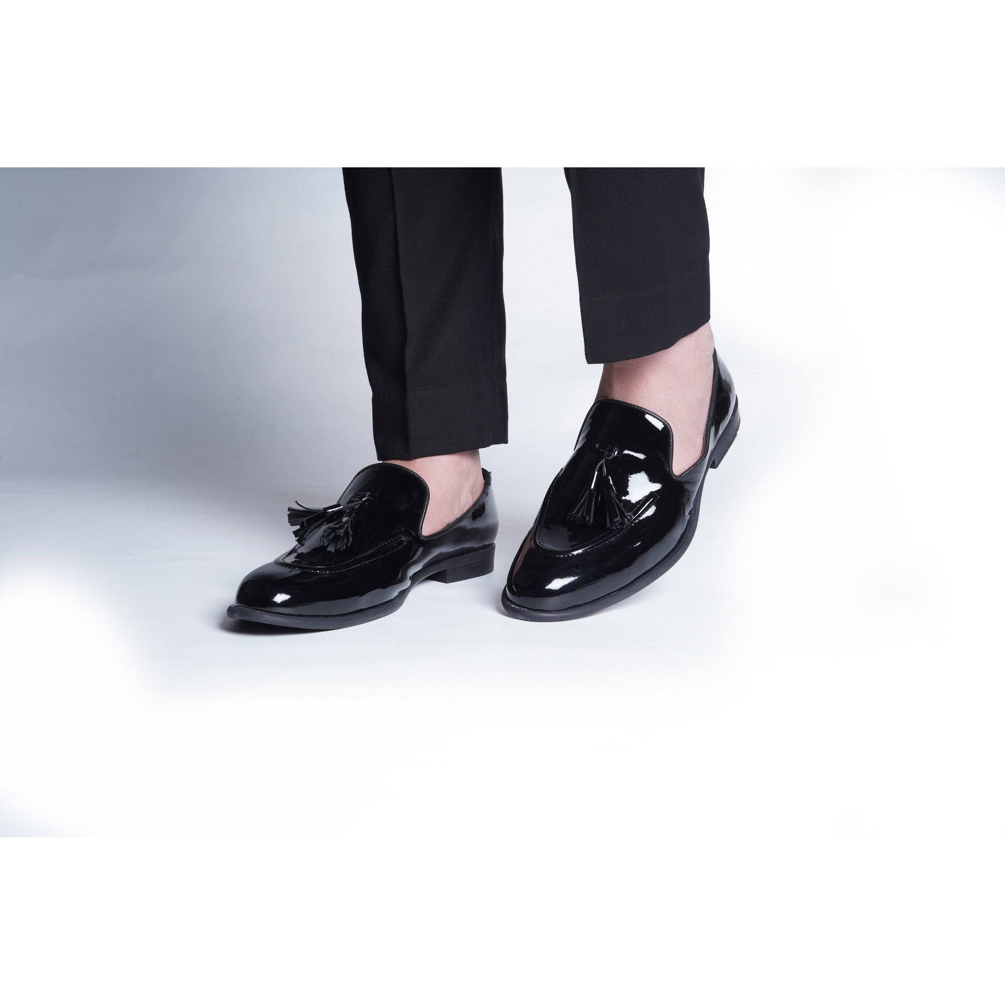 CLASSIC PATENT SLIP ONS WITH TASSELS
